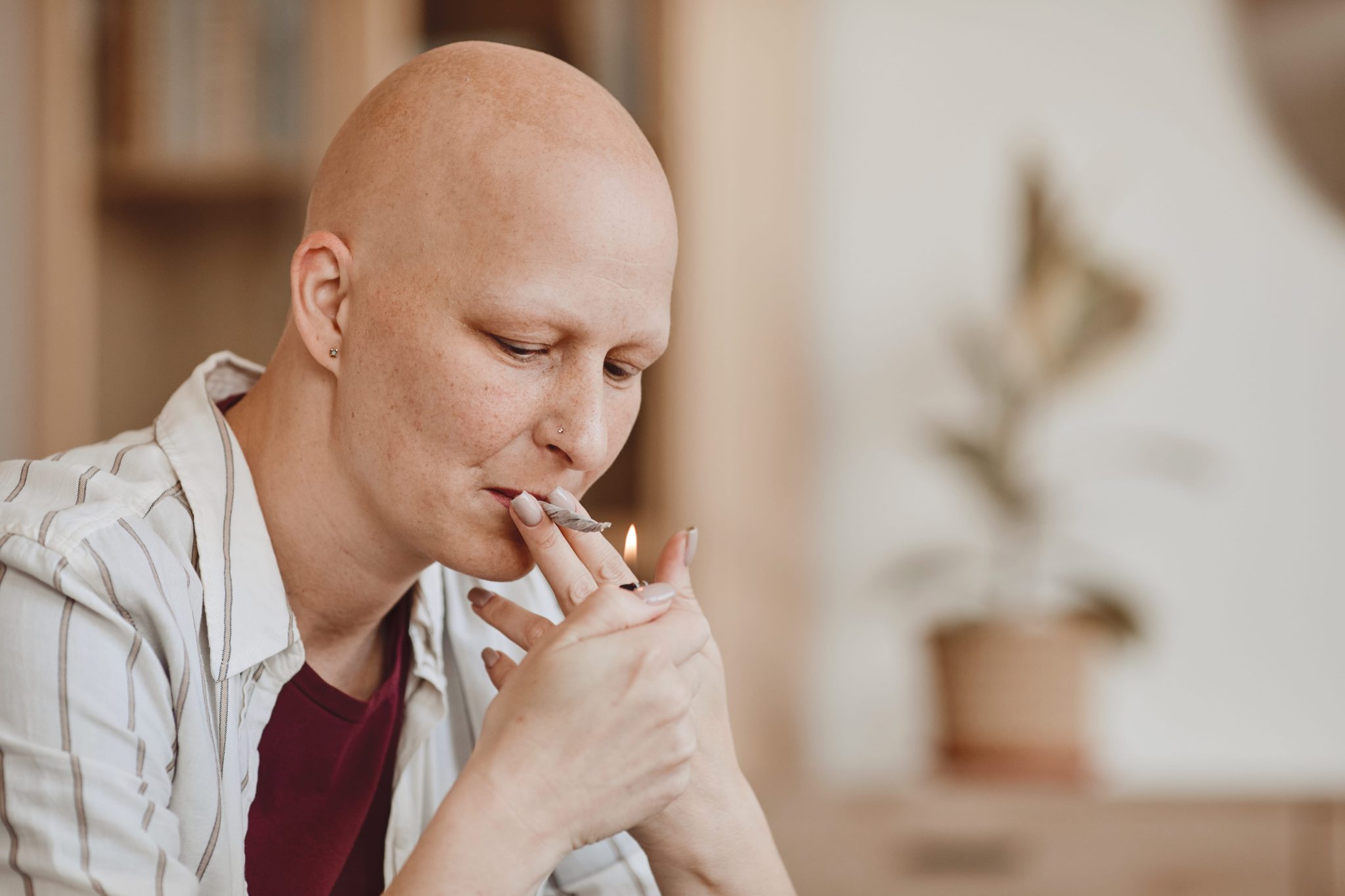 bald-woman-smoking-marijuana-joint-2022-02-02-03-56-56-utc-min-2048x1365.jpg